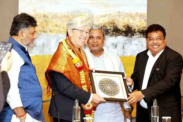 Young Liu, Chairman of Foxconn being received by CM Siddaramaiah, Deputy Chief Minister D K Shivakumar and Industries Minister M B Patil in Bengaluru. (X/MBPatil)